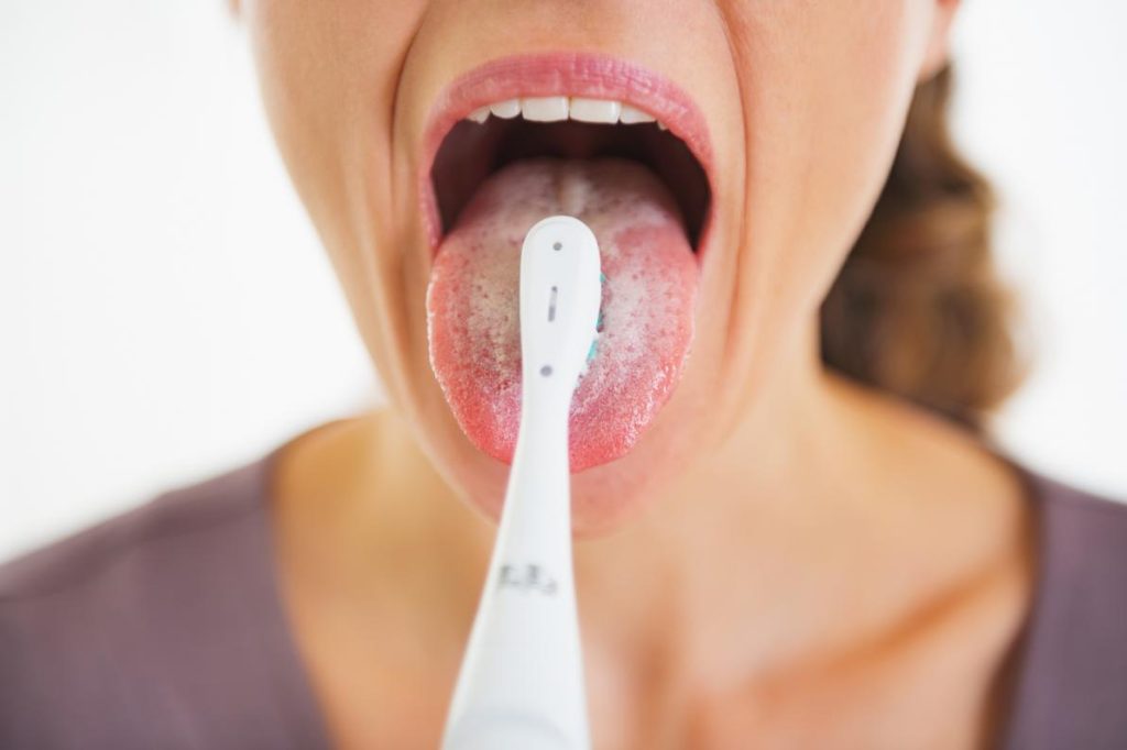 spazzolare lingua